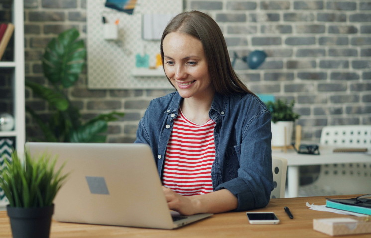 Woman working at laptop